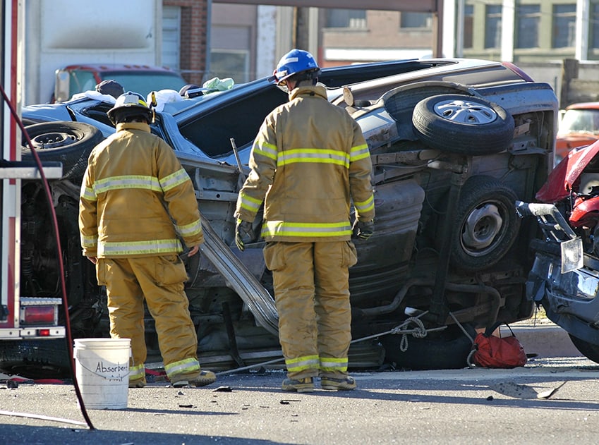 Flipped car fire fighters